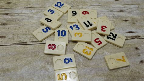 Rummikub: A Tile-Laying Masterpiece for Strategic Minds!