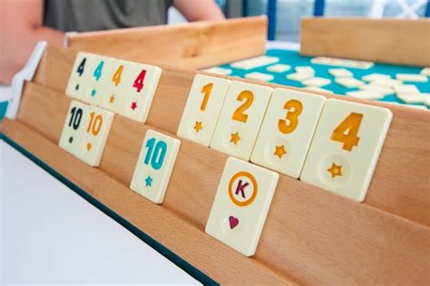 Rummikub: A Tile-Laying Game That Will Have You Shuffling and Scoring!